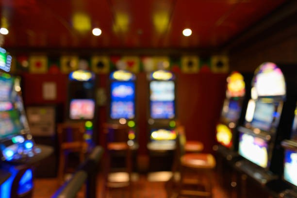 dt macau mobile app interface showing slot games and live casino options